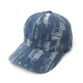 Closeup detail of the retro washed distressed denim baseball cap with unique printed pattern. - Adult 55-58cm / 9 Light Blue