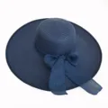 Detailed view of navy blue wide-brim straw sun hat with elegant ribbon bow for women - Adult 55-58cm / Navy Blue