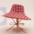 Red plaid bucket hat for women, wide brim foldable sun protection beach hat detail. - Red Plaid