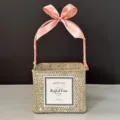 Hand-woven square straw gift basket featuring an elegant pink silk ribbon bow handle - Whitewashed Basket (Korean Pink Ribbon)