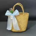 Handmade straw woven storage basket detail with elegant blue bow and decorative tag for gift. - 16*11cm / Light Blue Tulle + Basket + Flower Bouquet