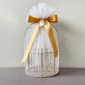 Golden wire gift basket with white star tulle and gold ribbon bow for weddings and parties. - Round Basket / Gold Star Moon Yarn