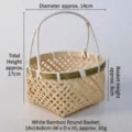 Close-up detail of a mini handmade woven bamboo basket showing precise dimensions - Round Basket