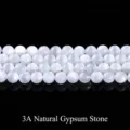 Perle tonde in selenite bianca naturale con effetto occhio di gatto - 3A Grade 6mm Pack / Bianco