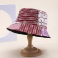 Details dieses modischen Damen Patchwork Fischerhuts mit bunten Musterdrucken und beidseitig tragbar. - 9