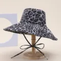 Grey leopard print wide brim bucket hat for women, foldable sun protection beach cap. - Leopard Gray