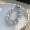 Elegant handmade colorful beaded phone charm with multi-style pearls and glitter beads - Blue and Purple