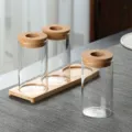 Minimalist set of 3 transparent glass hydroponic vases with cork lids and a wooden base. - 3 Pieces Cup Set With Cork And Tray