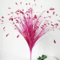 Detailed view of vibrant magenta glitter artificial onion grass for wedding decoration - Rose Red