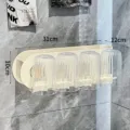 Wall-mounted cream bathroom organizer with 4 striped cups, dimensions 31x12x10cm - 4-Cup Set / 4-Cup Holder Cream
