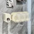 Cream-colored wall-mounted toothbrush holder set with 3 transparent vertical striped cups - 3-Cup + Dispenser Set / Combo 3-Cup Set Cream