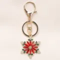 Elegante llavero de flor de copo de nieve de Navidad rojo con brillantes pedrerías - Rojo