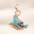 Vintage magpie bird keychain heavily embellished with blue rhinestones on gold alloy - Full Rhinestone Magpie Style / Lake Blue