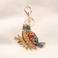 Vintage ornate magpie bird keychain with colorful rhinestones on gold alloy base - Full Rhinestone Magpie Style / Champagne