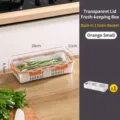 Small orange refrigerator storage box with drain basket and clear lid, 26x11x6.5cm - Single Basket / Small (1.35L) / Orange
