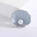 Elegant light blue enamel shell brooch featuring a central white pearl and crystal accents. - Light Blue Enamel Artificial Pearl Conch (b4-2-6229)