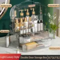 Luxury transparent cosmetic organizer with drawers and dustproof gold-accented lid - Double Door Makeup Box / 1 Piece / Clear