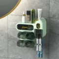 Mint green wall-mounted toothbrush holder with 4 cups and toothpaste dispenser - Quad Cups (With Toothpaste Holder) / Light Green