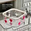 Close-up detail of a clear desktop storage box with cute pink heart patterns and rim. - Low Style with Press Ring (Heart Pattern)