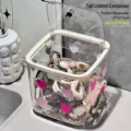 Detail view of a transparent desktop storage box with pink heart stickers and lid. - High Style with Lid (Heart Pattern)