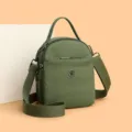 Bolso cruzado de nailon verde para mujer, mini bolso bandolera con múltiples bolsillos. - Talla única / Verde