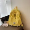 Fashionable yellow large capacity nylon student backpack for school and casual travel - Yellow