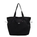 Large black travel shoulder bag with waterproof fabric for daily commute and vacation - One Size / Black