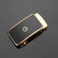 Close-up of high-end golden zinc alloy belt buckle with black face and G logo - External Threading Style / Gold