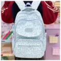 Detailed view of a light blue leopard print student backpack in a cozy study setting. - Blue