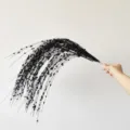 Détail d'une branche de saule à baies noires scintillantes pour décor de Noël - 98CM / Noir