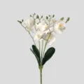 Detailed view of single stem artificial white orchid with green leaves for floral arrangements. - White