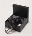 Close-up of a men's black leather business belt inside a minimalist black gift box - 110cm / With Gift Box / Gunmetal