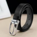 Detailed macro view of a 3.3cm black genuine leather belt featuring a silver pin buckle - 110cm / Silver Buckle Black