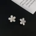 Sparkling silver-toned zircon flower stud earrings featuring a delicate minimalist design - Silver Flower Stud Earrings (R5458) / 1 Pair Pack / Silver