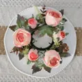 Detailed top view of pink artificial rose and maple leaf candle ring for table decor. - Artificial Rose Maple Wreath / Pink