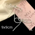 Close-up of elegant pearl bow shoe charms for sneakers, 9x9cm size detail. - Hand Beaded Bowknot Style (R3033) / 1 Pair / Milky White