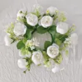 Detailed macro view of white tea rose and baby's breath floral candle wreath garland decor - White