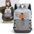 Zaino techwear funzionale con coulisse in rete e accenti arancioni per trekking - Blu