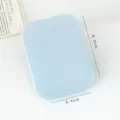 Portable mini folding makeup mirror in pastel light blue, compact size for daily carry. - Light Blue
