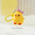 Cute 3D yellow chick keychain pendant featuring a pink bow and a matching yellow clasp - Chick With Bowknot Style