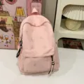 Pink casual backpack for women, cute butterfly print school bag with stylish zip pendants. - Pink