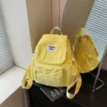 Κίτρινη casual νάιλον τσάντα πλάτης για γυναίκες, ελαφρύ μινιμαλιστικό σακίδιο σχολείου. - Κίτρινο