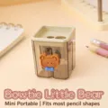 Mignon taille-crayon ours à deux trous avec coque translucide pour étudiants - Ours avec nœud