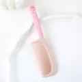 Peigne à cheveux en plastique avec poignée de lapin mignon, outil de coiffure portable et durable. - Lapin à Nœud Papillon Rose