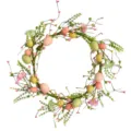 Easter wreath with pastel eggs, pink flowers and berries for festive wall decoration - Easter Egg Vine