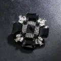 Broche vintage en cristal noir avec pierres géométriques et strass brillants. - Noir