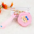 Pink silicone flower coin purse with cartoon girl character and blossom strap keychain - Bow Girl