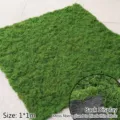 Detail showing the back side of 1x1m artificial moss turf with black cloth base. - Green Silky Moss / 1m x 1m