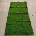 Close-up of a vibrant green rectangular artificial moss mat for wall landscaping decoration - Earth Brown Base Green Moss / 1m x 50cm