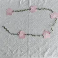 Pink paper flower garland with green leaf vine on white textured backdrop decoration - Pink Flower / 153cm
